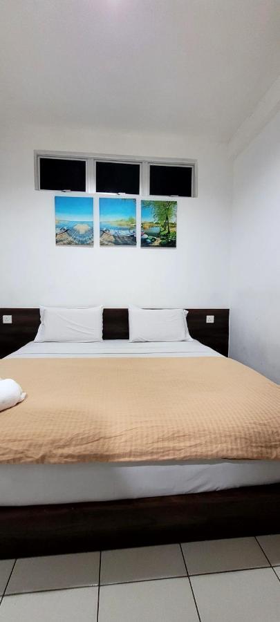 Api-Api Guesthouse Кота-Кинабалу Экстерьер фото